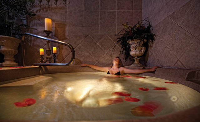 Spa Resorts In Tennessee - Woman Relaxing At Serenity Spa in Gatlinburg, TN