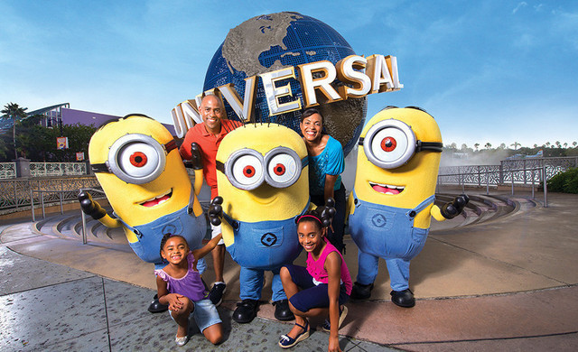 Family Posing With Minions