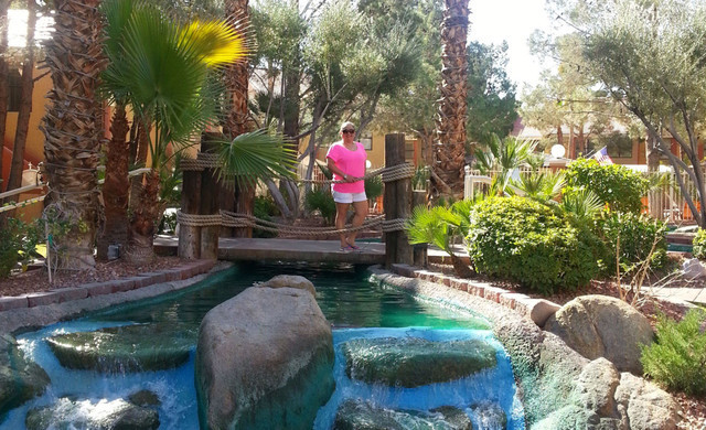 Westgate Flamingo Bay Resort - Woman on Bridge Overlooking Stream