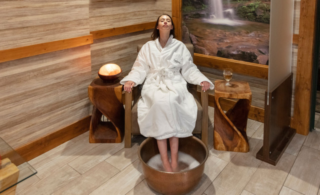 Woman Enjoying Spa Foot Bath