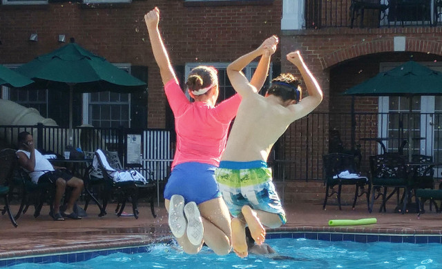 Kids Jumping in Pool | Historic Williamsburg Resort Travel Agents Rates