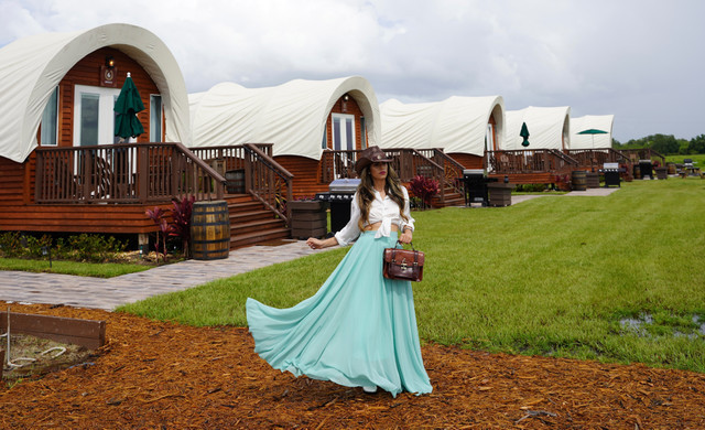 Girl in front of Wagons | Accommodations