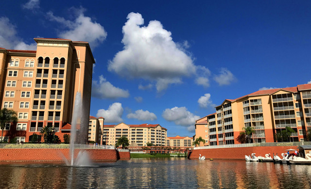 Buildings Surrounding Lake with Fountain | Westgate Vacation Villas