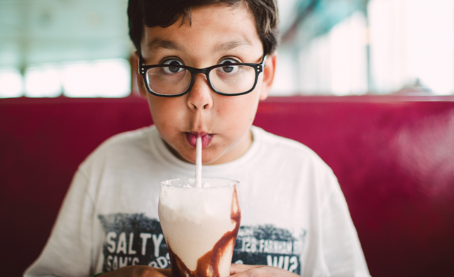 I Love Orlando Magazine | Little boy Drinking Milkshake