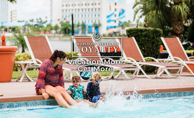 Toddlers playing in Orlando resort pool with Mom - WOW Loyalty - Westgate Palace Resort
