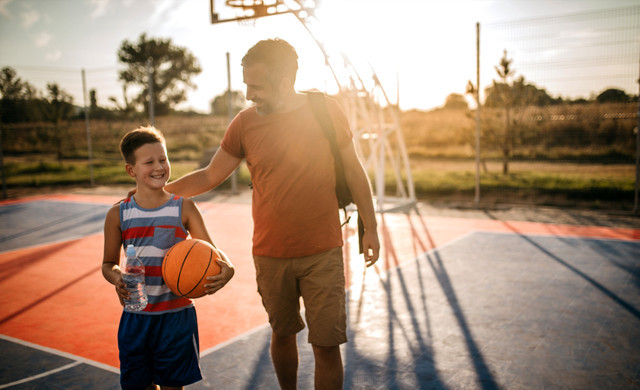 Father and son play basketball | Westgate Palace Resort in Orlando Florida | Westgate Resorts