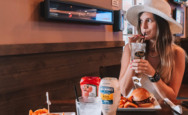 woman at drafts sports bar near universal studios - westgate lakes resort & spa