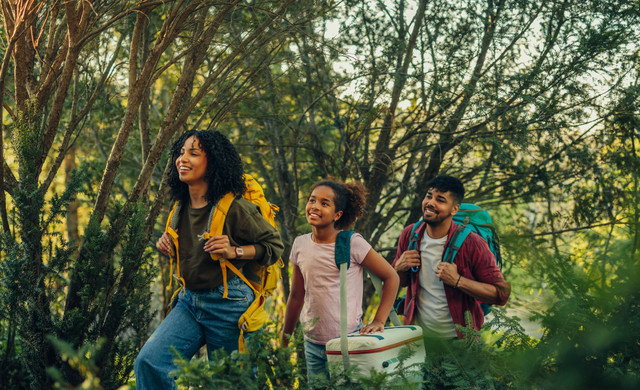 3 family members hiking on a trail in Gatlinburg, TN - Things to do in Gatlinburg | Westgate Smoky Mountain Resorts