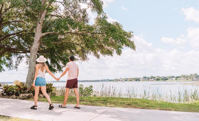 Online Exclusive - Lakes | Family Walking Down Stairs of Lakes