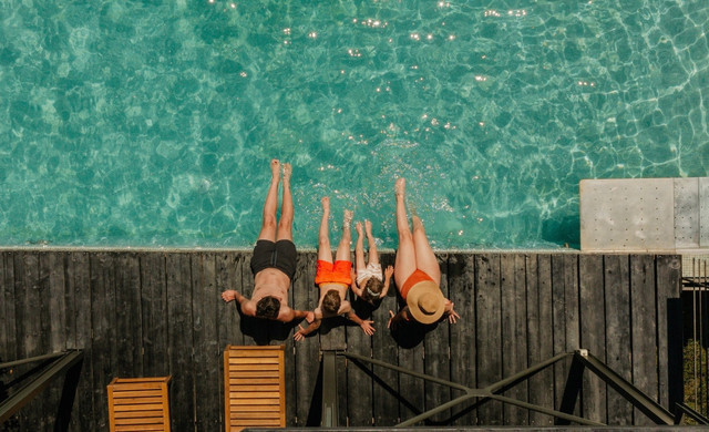 family at dock with crystal water - westgate timeshare