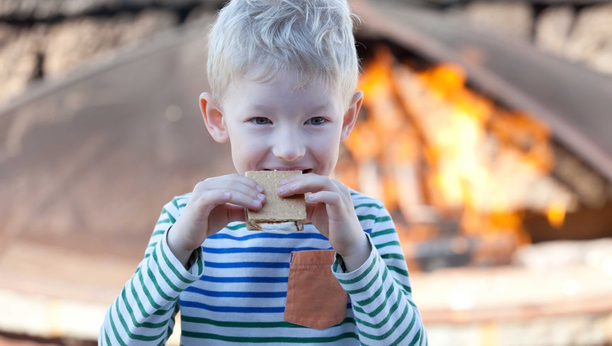 Boy Eating S'mores | Westgate River Ranch Resort & Rodeo