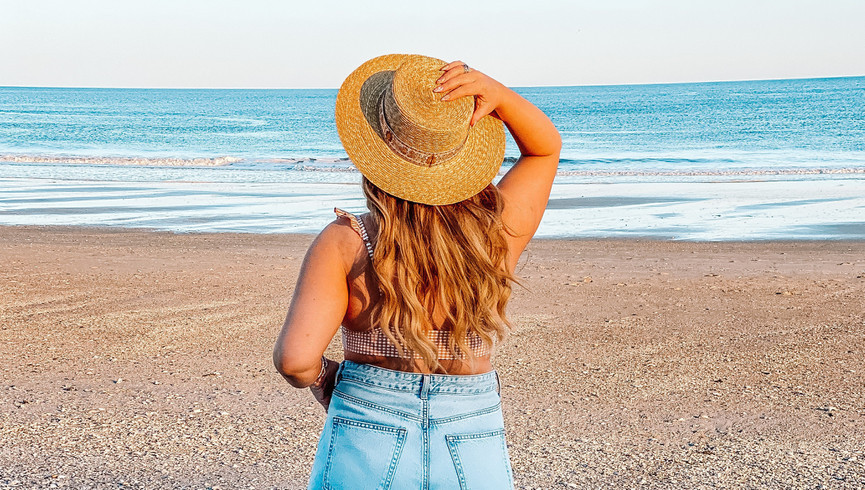 Westgate Waves Spring Break Hotel Special - Food and Hat on Table by the Beach