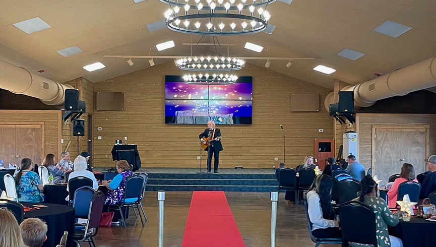 Extravaganza Show Package - Westgate Branson Woods Resort - Man playing guitar on stage