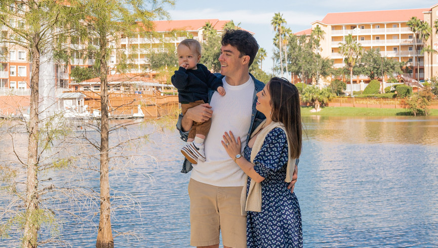 Kissimmee Resorts - Family standing by the lake