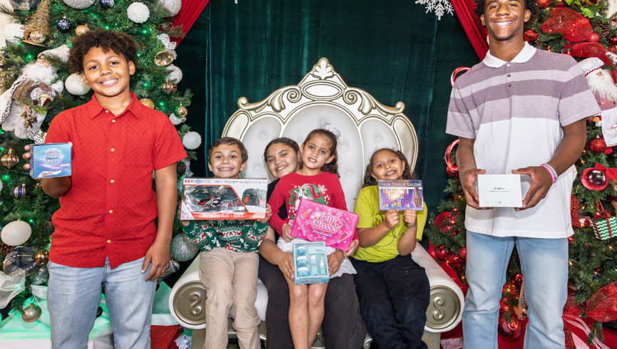 Kids holding gifts 