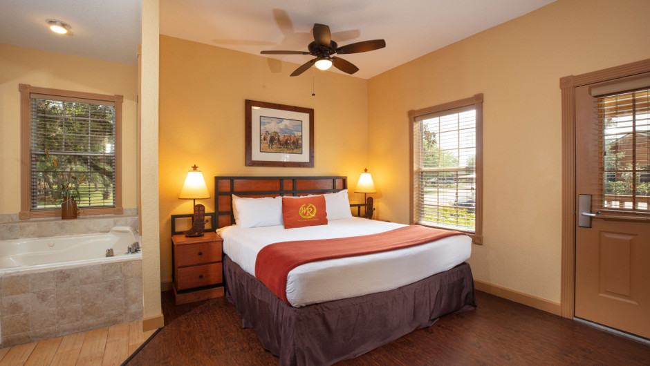 Bedroom in our Saddle Club One-Bedroom Grand Cabin - Westgate River Ranch Resort & Rodeo