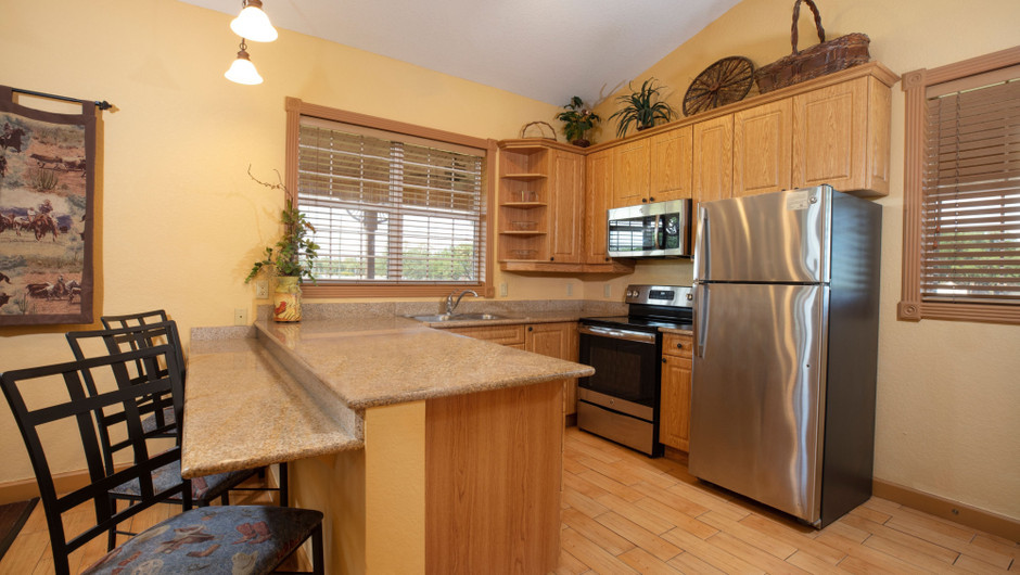 Kitchen in our Saddle Club One-Bedroom Grand Cabin |  Westgate River Ranch Resort & Rodeo | Westgate Resorts
