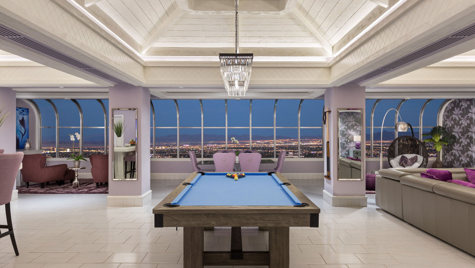 Living Area with billiards table and city views in the Bahamas Suite - Westgate Las Vegas Resort