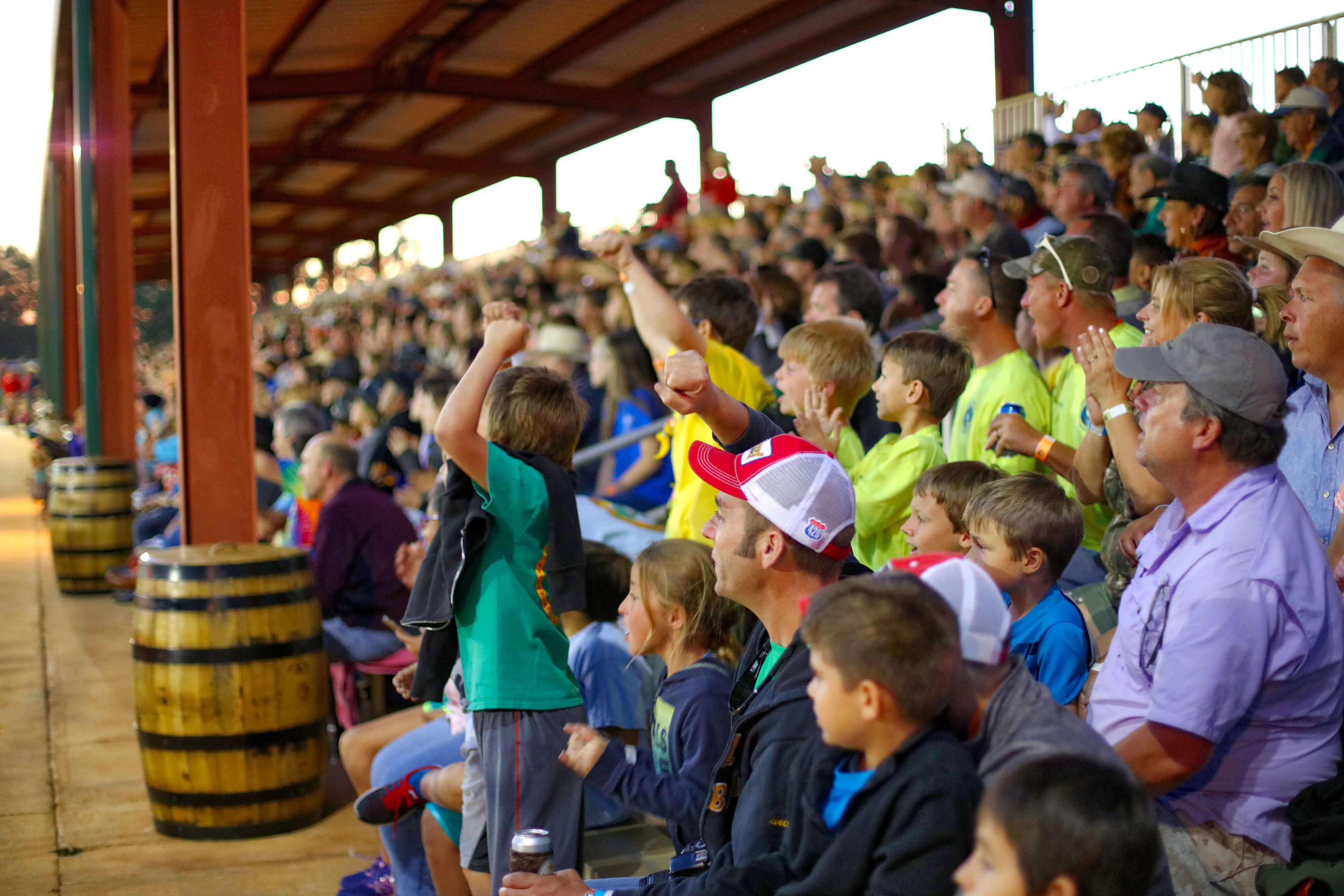 Families cheering at Championship Rodeo | Westgate River Ranch Resort & Rodeo | Westgate Resorts