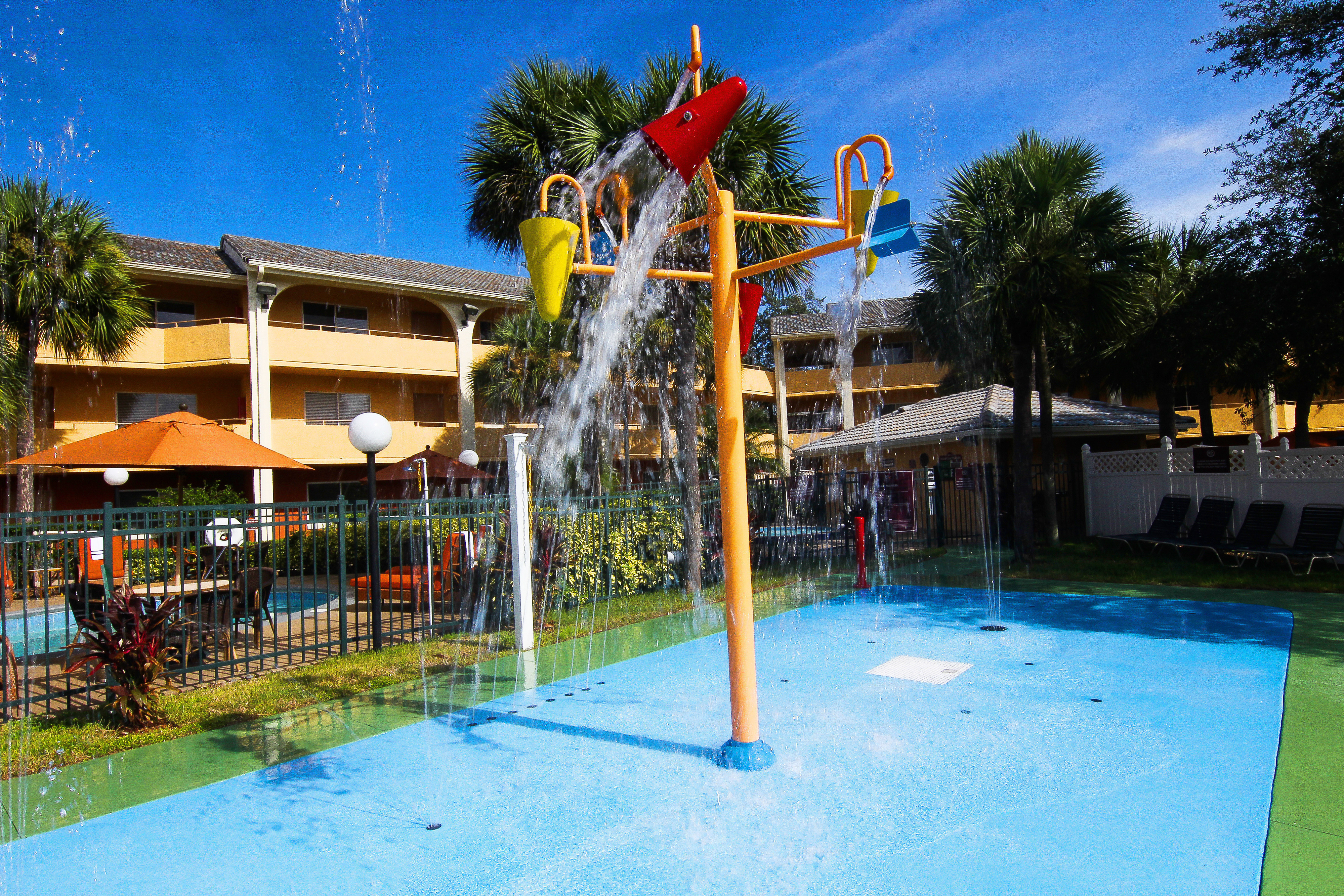 Children's Water Play Area with Heated Outdoor Pool in background | Westgate Leisure Resort