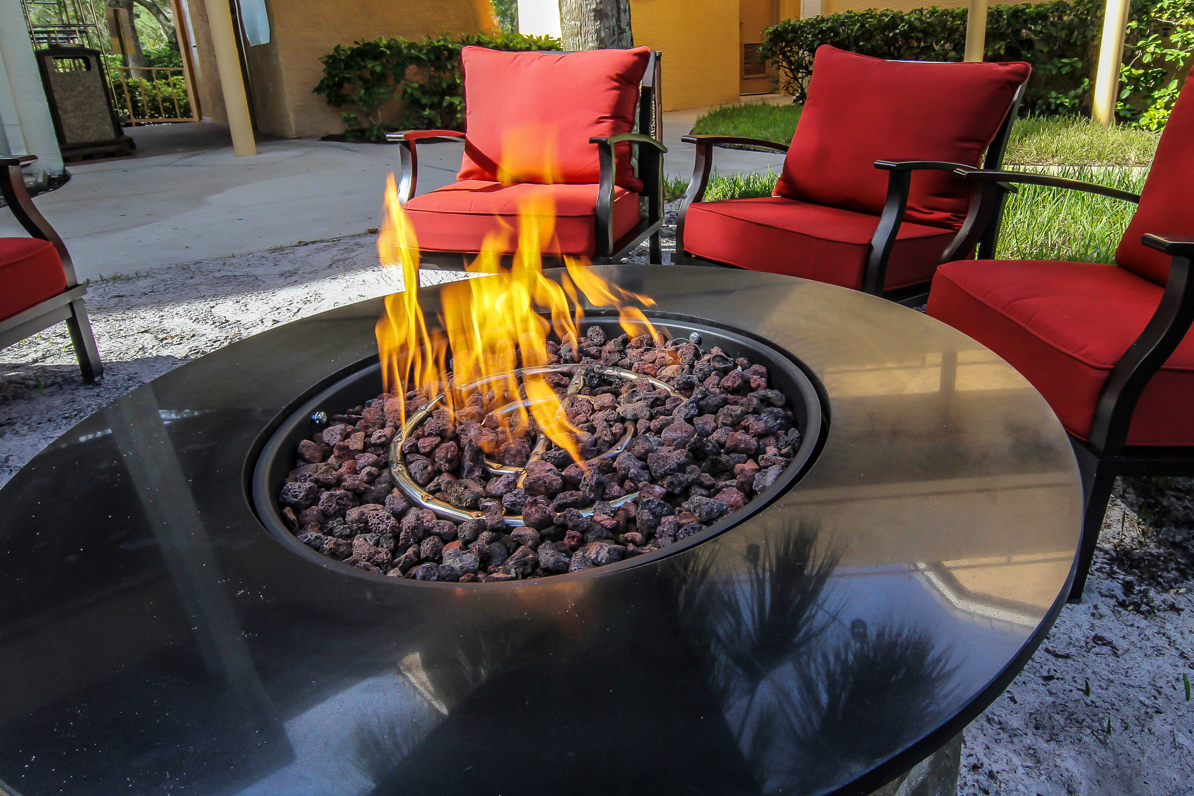 Fire Pit surrounded by chairs at one of our leisure hotels next to Seaworld Orlando | Westgate Leisure Resort | Westgate Resorts