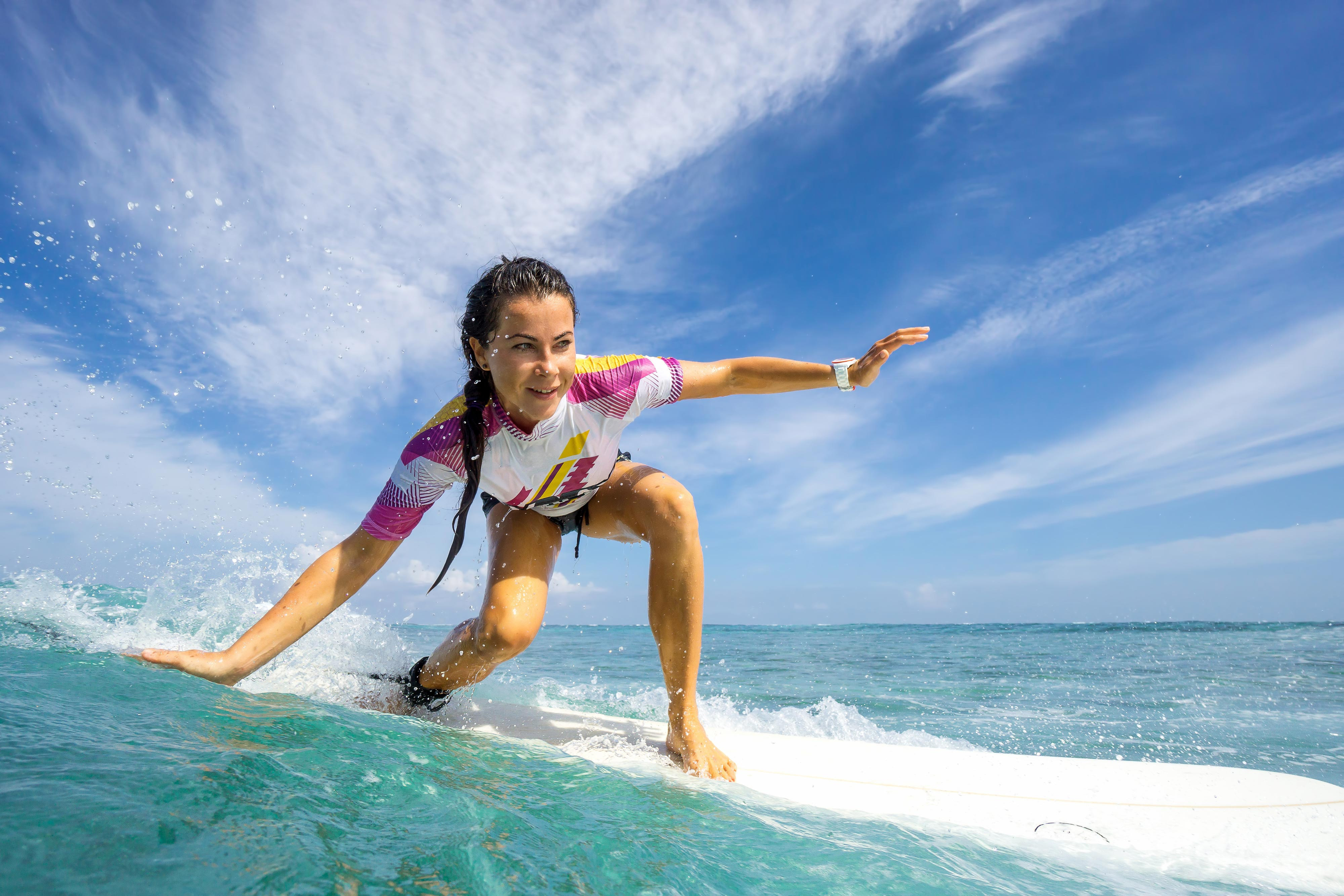 Atlantic Surfing Woman Action Shot - Westgate Cocoa Beach Pier
