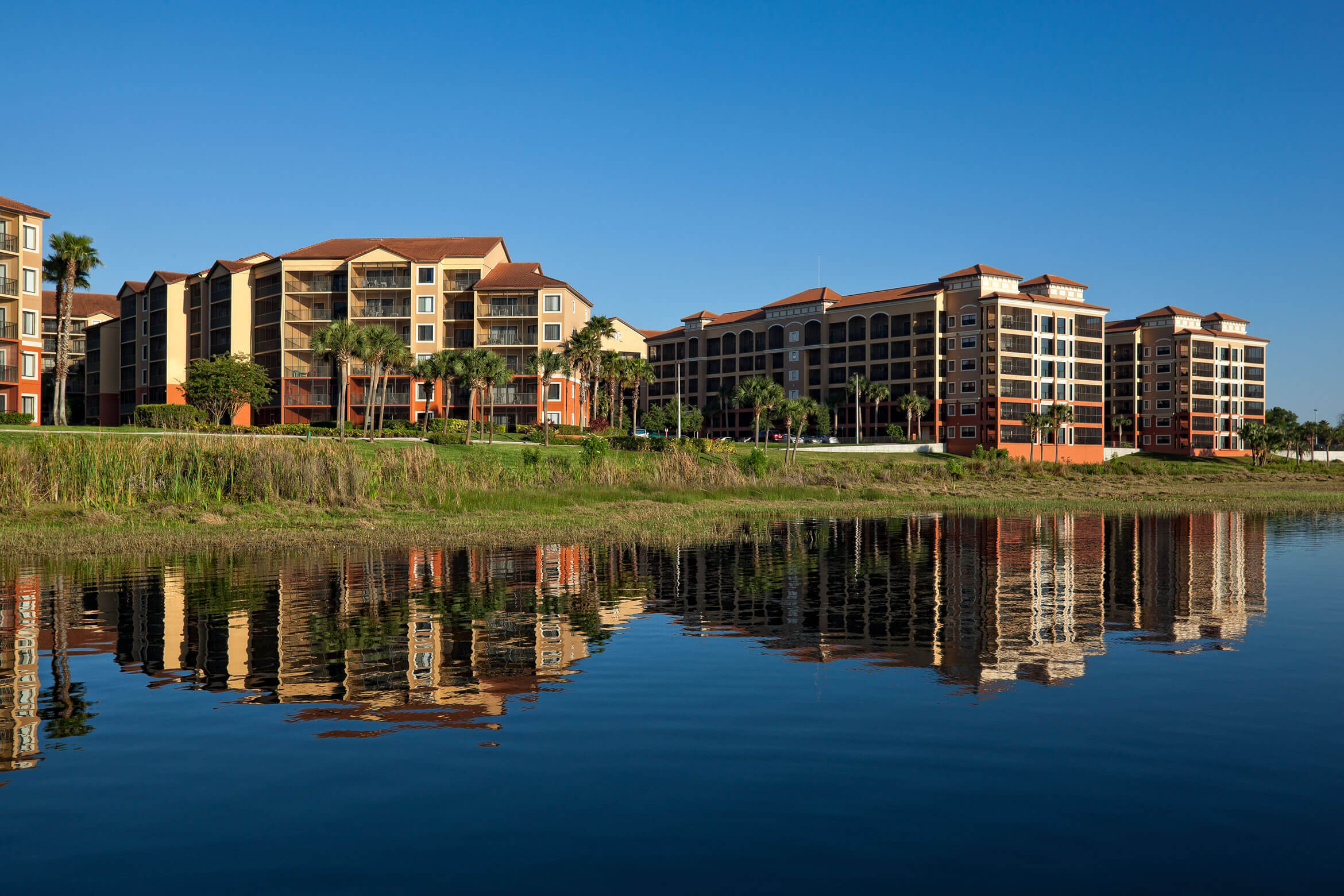 Resort Building Seen from Lake | Westgate Lakes Resort & Spa | Orlando, FL | Westgate Resorts
