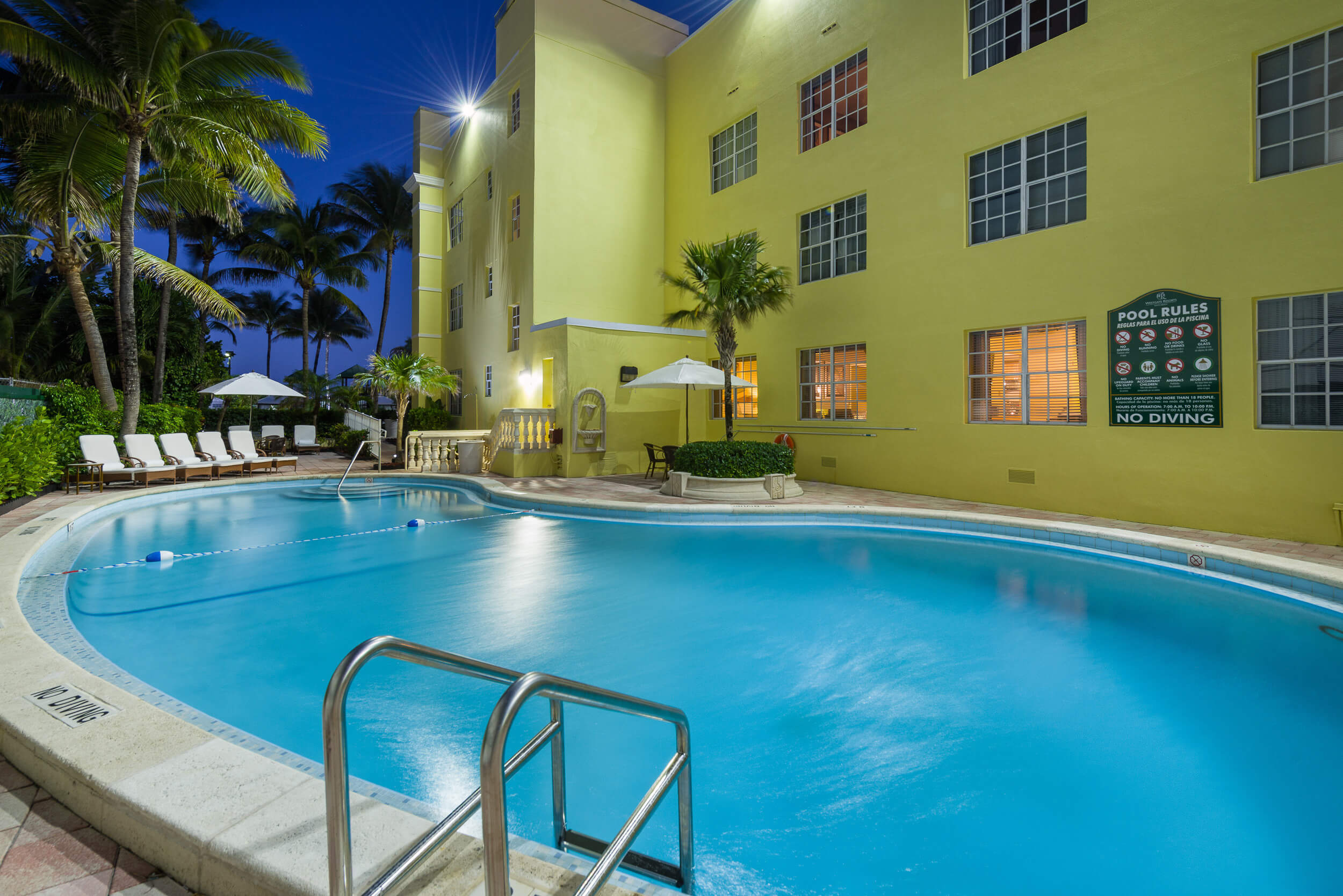 Heated outdoor pool with lounge chairs | Westgate South Beach Oceanfront Resort