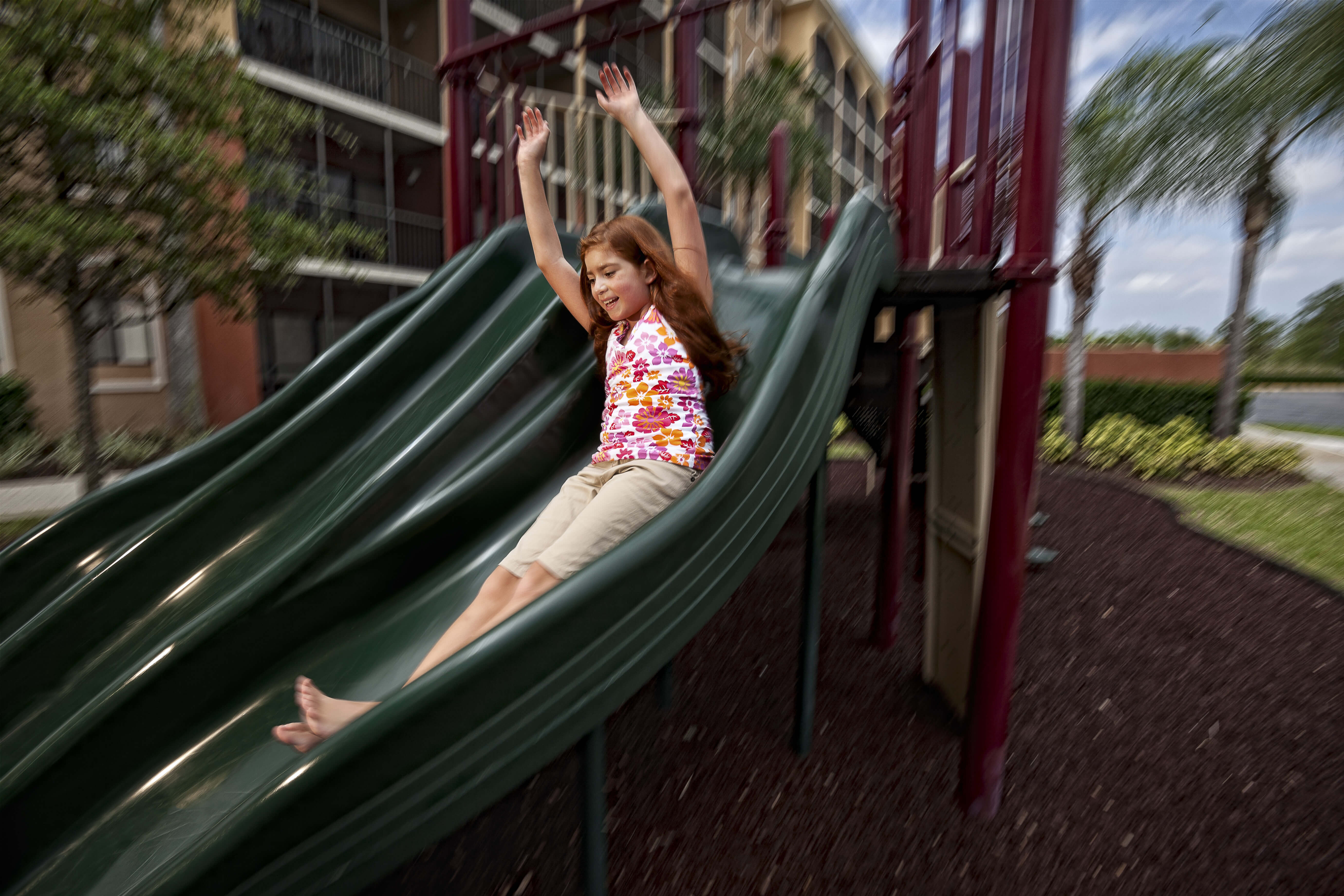 Kid on slide at Playground | Westgate Towers Resort | Westgate Resorts