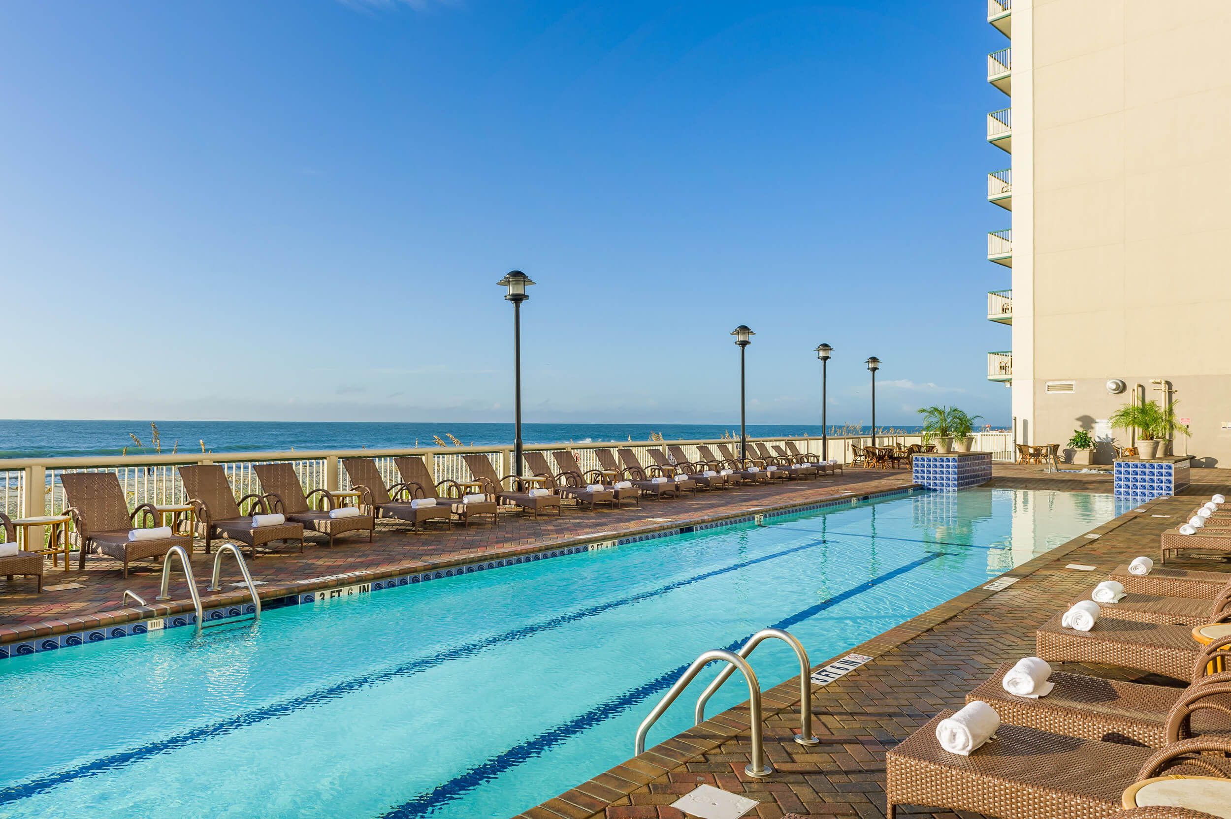 Heated outdoor pool with beach in background | Westgate Myrtle Beach Oceanfront Resort