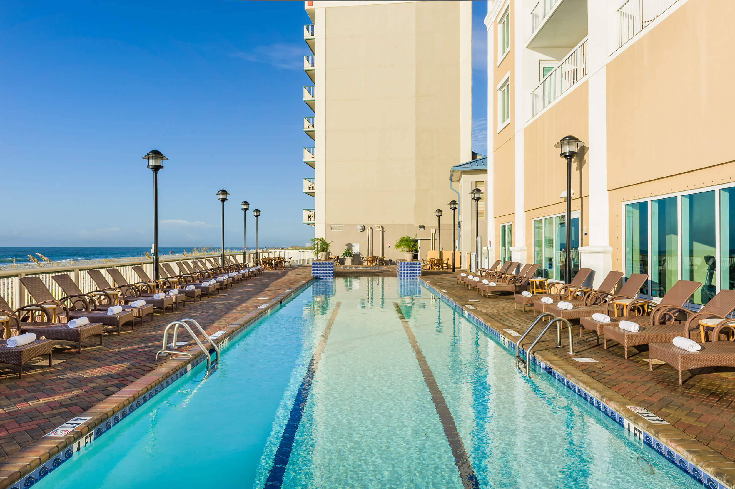 Large heated outdoor pool with lounge chairs | Westgate Myrtle Beach Oceanfront Resort