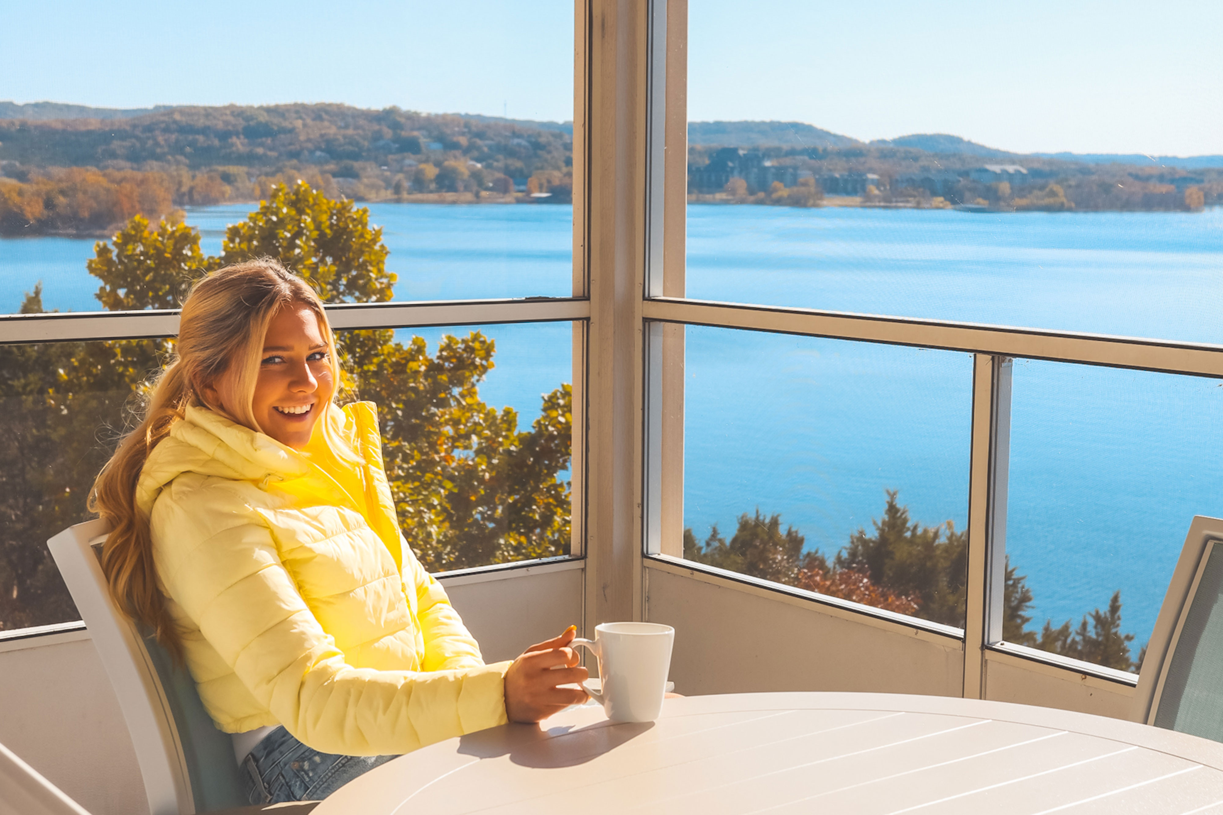 Online Exclusive Hotel Deal - Westgate Branson Lakes Resort - Woman on lake view balcony