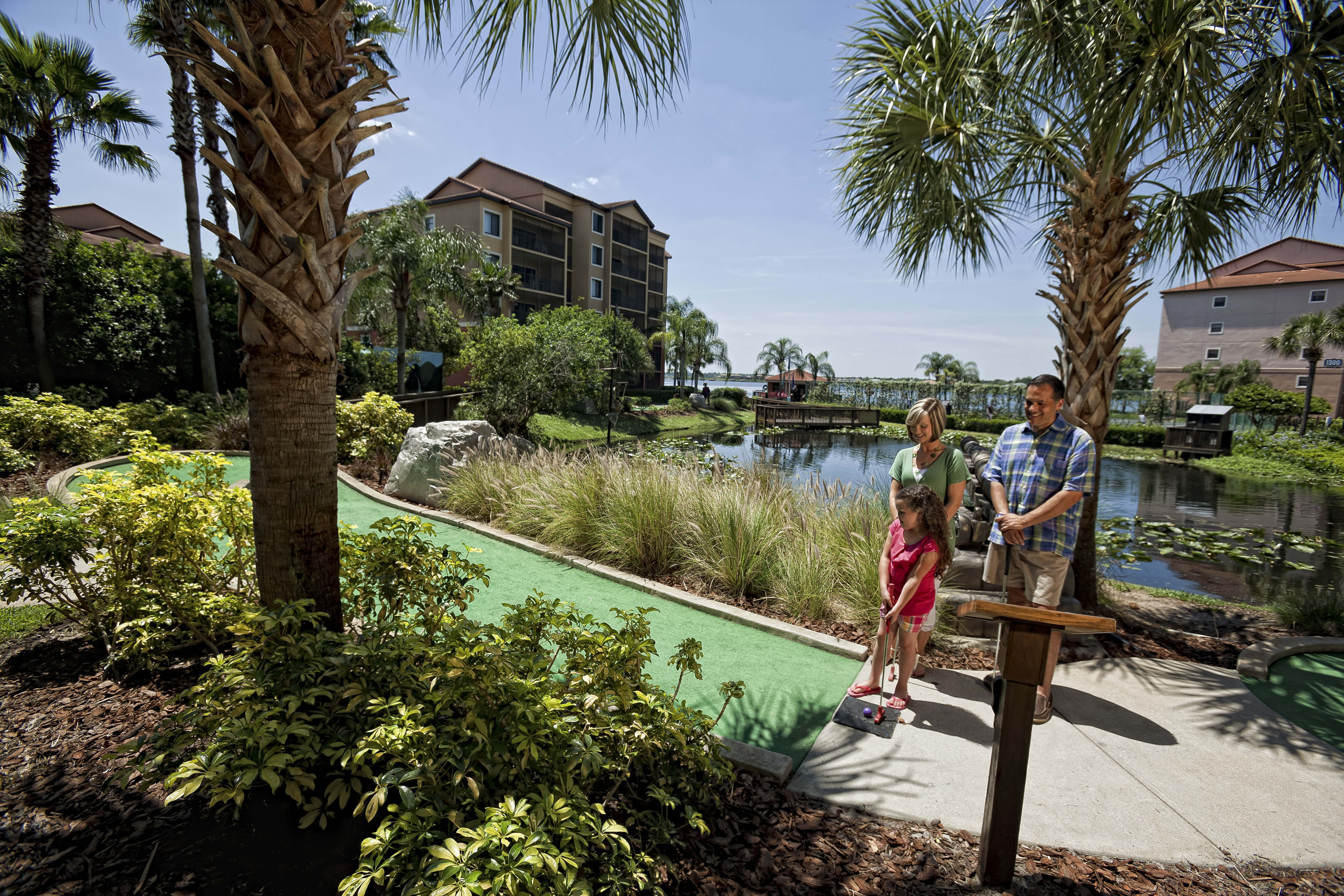 Family Playing Miniature Golf | Westgate Lakes Resort & Spa | Orlando, FL | Westgate Resorts
