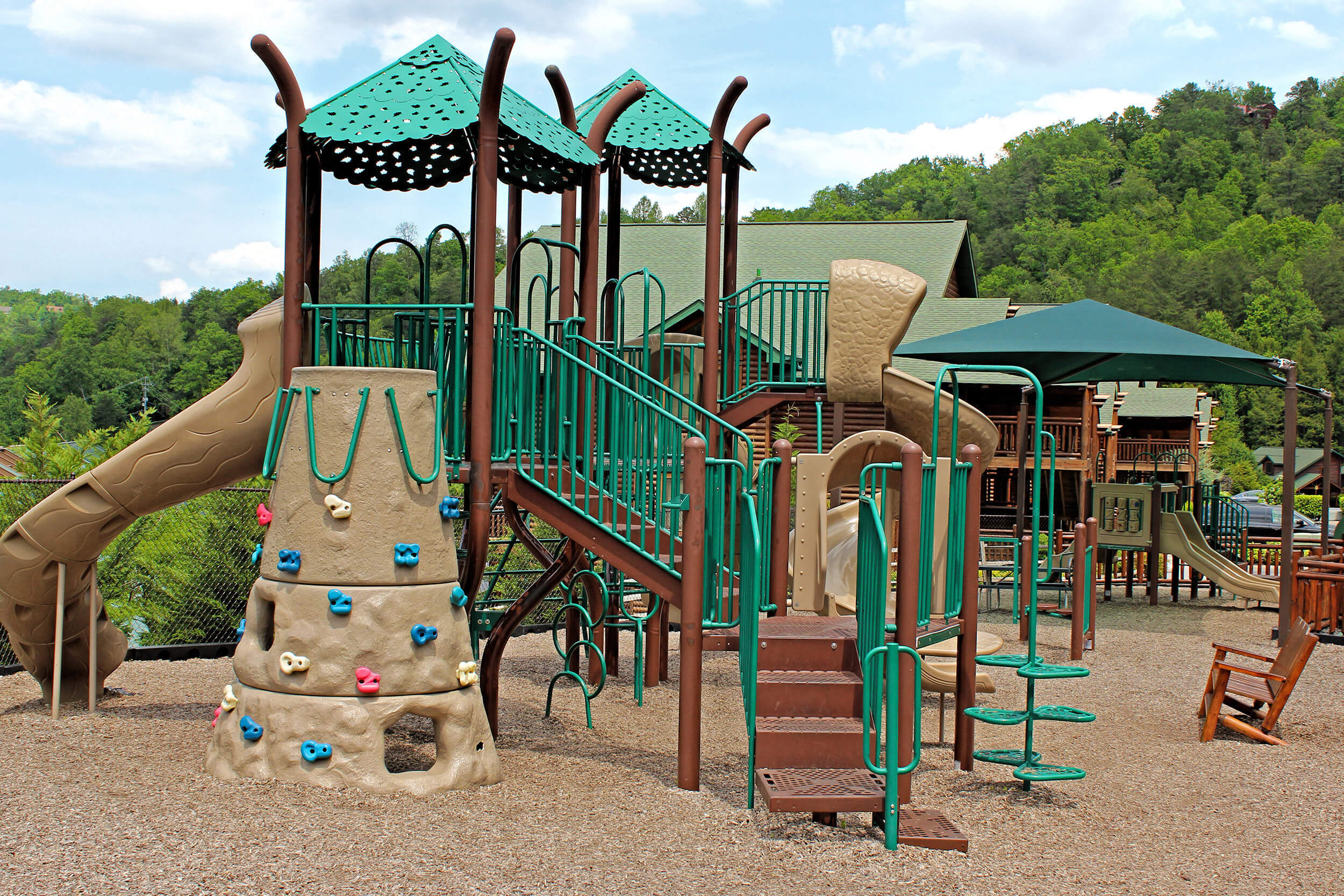 Onsite Playground with mountains in background | Westgate Smoky Mountain Resort & Spa