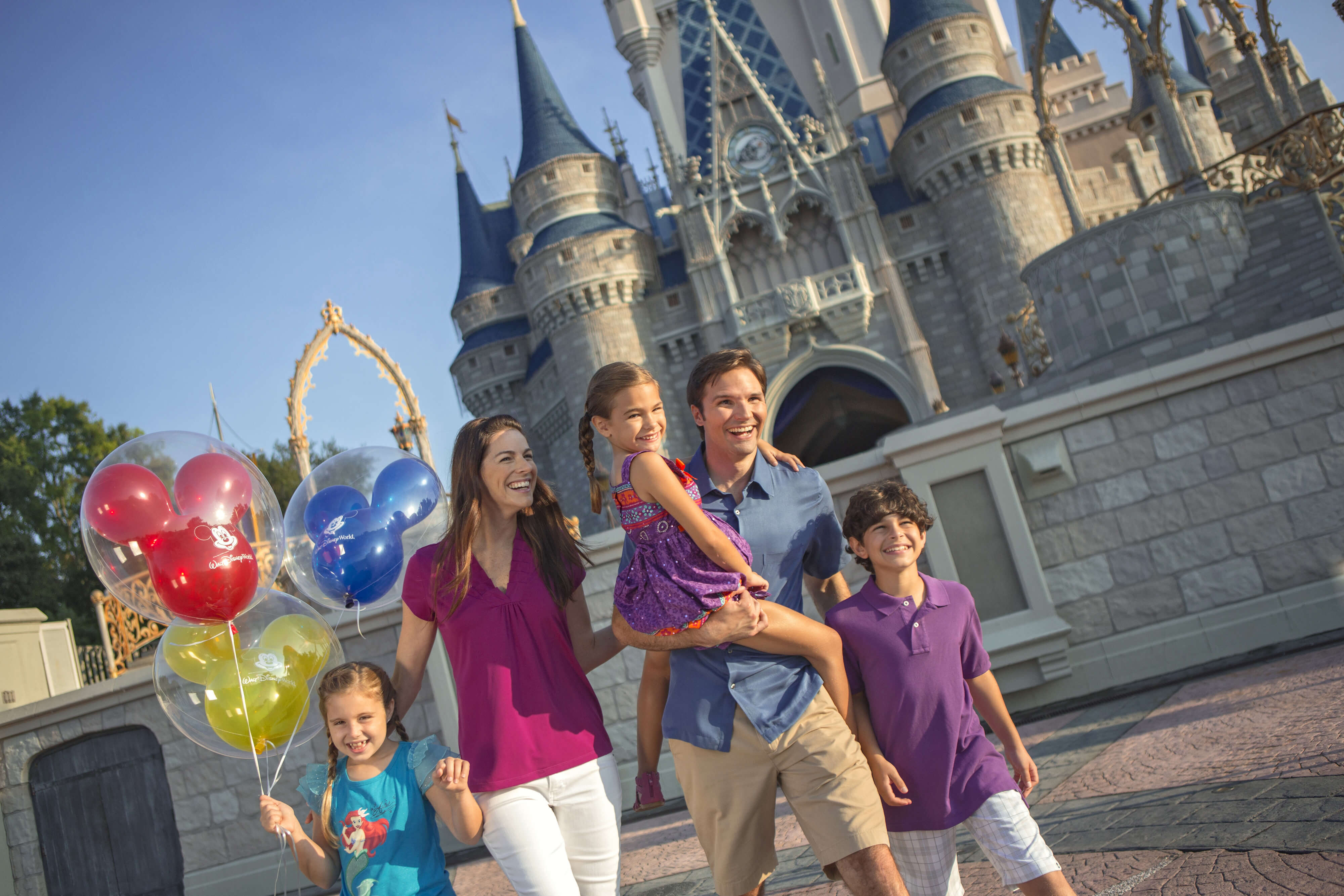 Familia disfrutando de su día en un parque de Disney | Resorts en Westgate