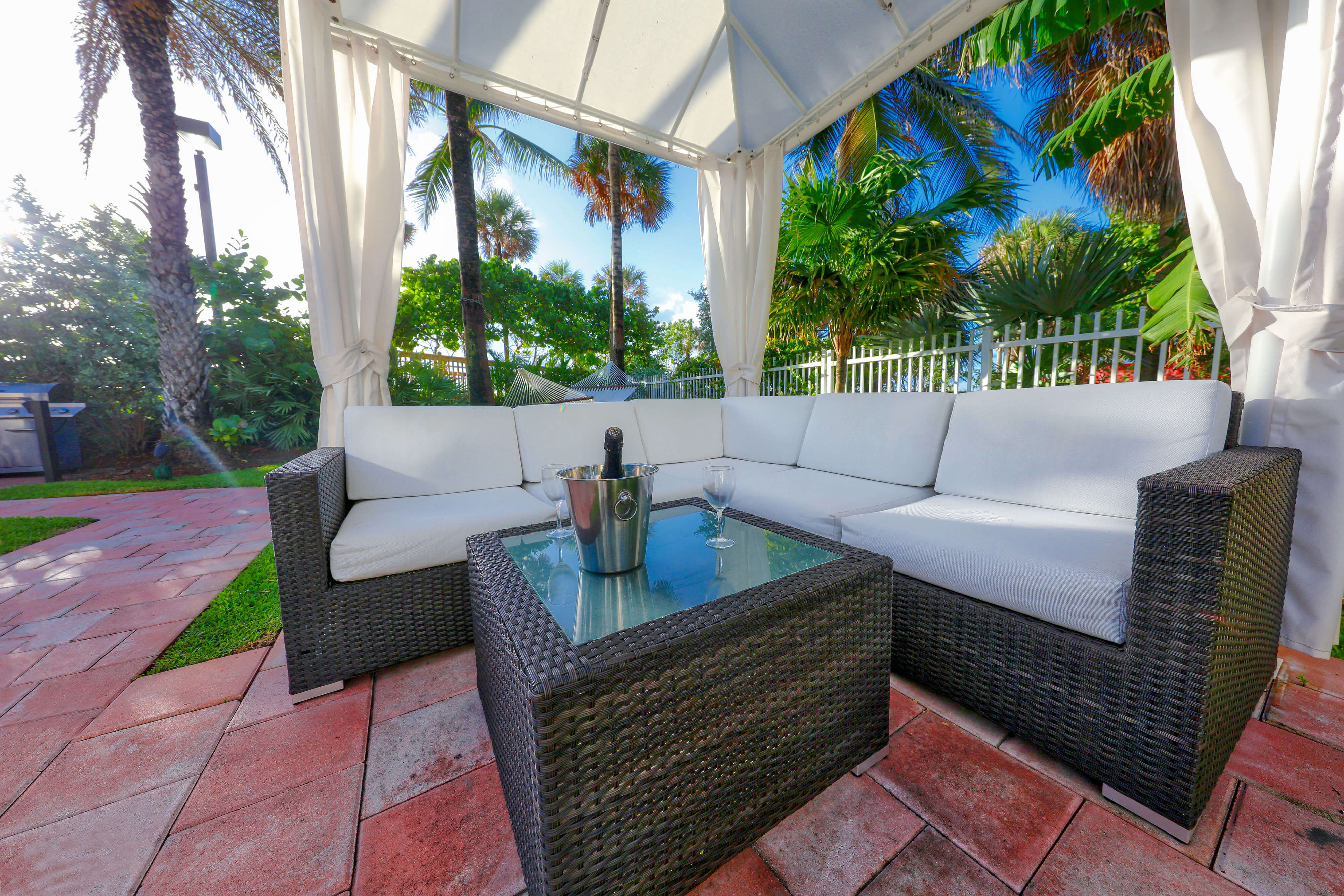 Private cabana surrounded by tropical landscaping | Westgate South Beach Oceanfront Resort