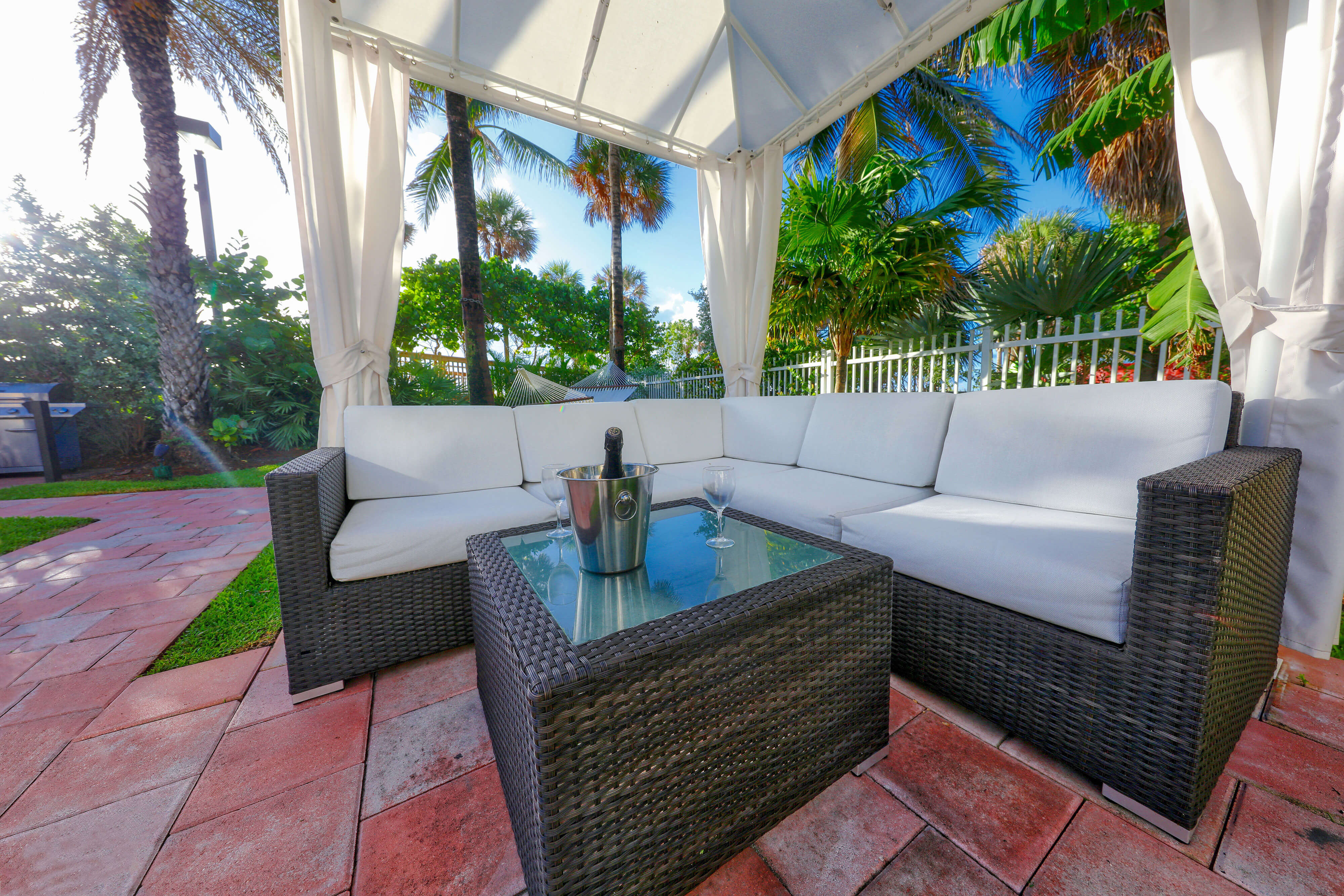 private cabana with champagne on outdoor deck | Westgate South Beach Oceanfront Resort